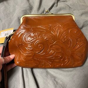 Tooled leather Patricia Nash clutch
